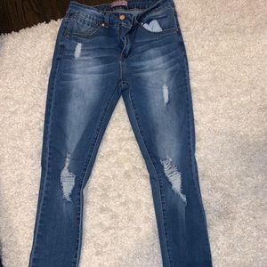 Ripped blue skinny jeans